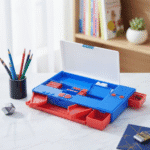 Space Astronaut Multipurpose Pencil BoxSpace box pencil boxCRAFTY CUDDLEBlue and red pencil box on a desk with pencils and a plant in the backgroundpencilbox kidsstationery schoolstationery stationerylove stationeryaddict schoolessentials backtoschool kidsproducts cutestationery studentessentials