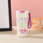 Cartoon Print Leakproof FlaskCartoon Kids Water BottleCrafty CuddleColorful water bottle with a purple handle on a pink backgroundCreamKidsWaterBottle SchoolEssentials CartoonBottle StainlessSteelBottle LeakproofBottle KidsAccessories BackToSchool CuteStationery InsulatedBottle KidsHydration