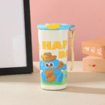 Cartoon Print Leakproof FlaskCartoon Kids Water BottleCrafty CuddleColorful tumbler with cartoon character and 'Happy Day' text on a pink backgroundBlueKidsWaterBottle SchoolEssentials CartoonBottle StainlessSteelBottle LeakproofBottle KidsAccessories BackToSchool CuteStationery InsulatedBottle KidsHydration