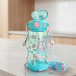 Children's water bottle with mermaid and sea-themed design on a light surface.