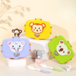 Set of colorful lunch boxes with animal designs on a beige background