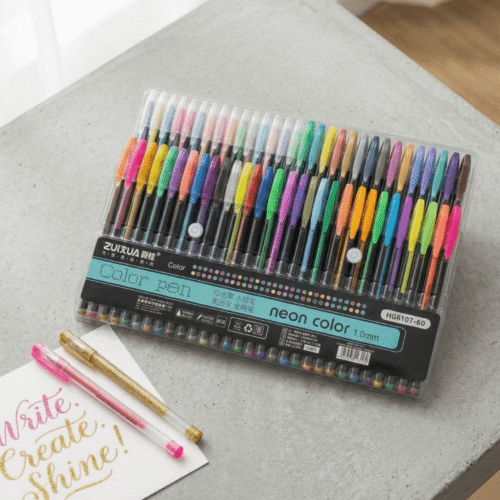 Set of colorful pens in a clear plastic case on a gray surface with a small piece of paper.
