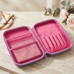 Purple Unicorn EVA Pencil PouchUnicorn EVA pencil pouch boxCRAFTY CUDDLEPink jewelry case with compartments on a wooden surface with flowers in the backgroundPurple Unicorn Big EVA Pouchbig pencil pouch for kidscute pencil pouch