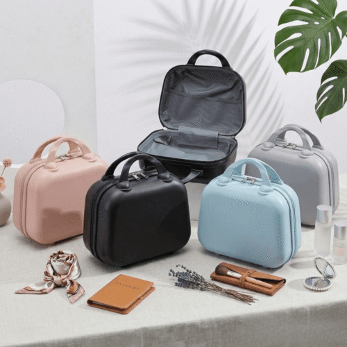 Set of colorful travel cases on a surface with accessories.