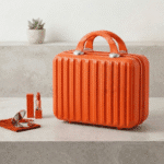 Mini Travel Organizer Case for KidsTravel BagsCrafty CuddleOrange makeup case with lipsticks and a compact on a light surface.OrangeKidsStorage MiniSuitcase KidsOrganizer ToyStorage StationeryOrganizer KidsTravelEssentials CuteStorageBox TravelOrganizer KidsAccessories KidsProducts