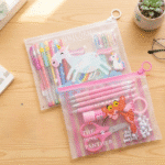 Cute Mini Cartoon Zipper PouchPencil PouchCrafty CuddleTwo clear pouches with stationery items on a wooden surface, featuring cartoon characters.1MiniPouch CuteStationery CartoonPouch KidsPouch CoinPouch StationeryLovers CuteAccessories KidsStationery SmallOrganizer KawaiiStationery