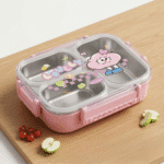 Lovely Cartoon Kids Lunch BoxStainless Steel Lunch BoxCrafty CuddlePink and stainless steel lunch box with cartoon character on a wooden surfacePink