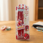 Little Tree Food Theme Pencil SetWriting PencilsCrafty CuddlePackaged red pencils with a cartoon character on a wooden surfaceRedLittleTree KidsStationery PencilSet SchoolStationery GraphitePencils CuteStationery KidsPencilSet BackEraserPencil ReturnGiftIdeas SchoolSupplies