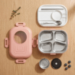 Big Size 4 - Compartment Stainless Steel Lunch BoxStainless Steel Lunch BoxCrafty CuddlePink lunch box with compartments and accessories on a wooden surfaceLunchBox BentoLunchBox LunchBoxForKids SchoolLunchBox StainlessSteelLunchBox LunchBoxWithCompartments HealthyLunch MealPrepBox KidsLunchBox TiffinBox