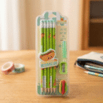 Little Tree Food Theme Pencil SetWriting PencilsCrafty CuddleSet of green pencils with a sharpener in clear packaging on a wooden surface.GreenLittleTree KidsStationery PencilSet SchoolStationery GraphitePencils CuteStationery KidsPencilSet BackEraserPencil ReturnGiftIdeas SchoolSupplies