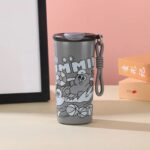 Cartoon Print Leakproof FlaskCartoon Kids Water BottleCrafty CuddleGray tumbler with cartoon design on a pink backgroundGreyKidsWaterBottle SchoolEssentials CartoonBottle StainlessSteelBottle LeakproofBottle KidsAccessories BackToSchool CuteStationery InsulatedBottle KidsHydration