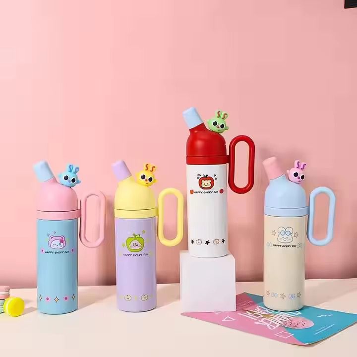 WhatsAppImage2026-03-26at5.41.15PM_3-1 Set of colorful water bottles with cartoon designs on a pink background