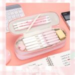 3D Cartoon Double Layer Pencil PouchPencil PouchCrafty CuddleDouble - layer pencil case with stationery items on a pink surfaceBlue (Rocket)pencilpouch 3dpencilcase kidsstationery doublelayerpencilcase cartoonpencilpouch schoolstationery stationeryforkids cutestationery backtoschool studentstationery