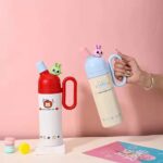 Cute Cartoon Stainless Steel Water Bottle with HandleCartoon Kids Water BottleCrafty CuddleTwo children's thermos bottles with cartoon designs on a pink backgroundstainlesssteelbottle insulatedbottle largecapacity waterbottle hydration reusablebottle leakproof travelbottle gymessentials trendingproducts