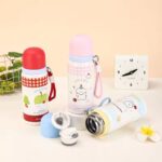 Cute Cartoon Stainless Steel Water BottleCartoon Kids Water BottleCrafty CuddleThree cartoon - themed water bottles on a table with a clock in the background.Brown