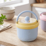 Kids Insulated Soup Lunch Box with HandleStainless Steel Lunch BoxCrafty CuddlePastel - colored container with a handle on a wooden surface, with 'Piko Pono' branding.BlueKidsLunchBox InsulatedLunchBox FoodJar SoupContainer KidsEssentials SchoolLunch LunchBoxIdeas HotLunch TiffinBox KidsMeal