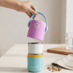 2 Layer Insulated Lunch Box with HandleStainless Steel Lunch BoxCrafty CuddleStackable containers with a purple top, white middle, and blue bottom on a neutral background.GreenLunchBox TiffinBox InsulatedLunchBox LeakproofLunchBox OfficeEssentials KidsLunchBox MealPrepIndia FoodStorage LunchOnTheGo KitchenEssentials