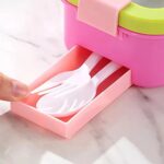 Leakproof Bento Box with Spoon ForkStainless Steel Lunch BoxCrafty CuddlePink and green container with white spoons inside, on a marble surface.Dinosaur