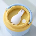 Kids Insulated Soup Lunch Box with HandleStainless Steel Lunch BoxCrafty CuddleYellow and light blue container with a white spoon fork on a light gray backgroundBlueKidsLunchBox InsulatedLunchBox FoodJar SoupContainer KidsEssentials SchoolLunch LunchBoxIdeas HotLunch TiffinBox KidsMeal