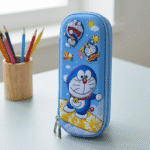 Pencil case with cartoon character design on a table with colored pencils.