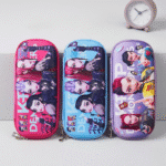 Three colorful pencil cases with character designs on a white background