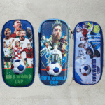 Three pencil cases featuring images of soccer players and the FIFA World Cup logo on a gray background.